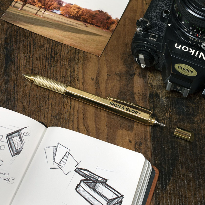 gold multi tool DIY gift pen in black case works as spirit level, ruler, screwdriver and antislip grip lifestyle image